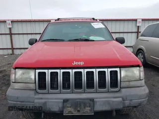 1996 Jeep Grand Cherokee Laredo with VIN 1J4GZ58Y3TC350926, listed as a IAAI auction lot 41224374 with 266,833 mi miles. Bid and sale history available at carsss.com. Image 6.