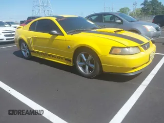 2004 Ford Mustang GT Deluxe z VIN 1FAFP42XX4F148088, wystawiony jako IAAI lot #41995663 z przebiegiem 182 273 mil mil oraz . Historia ofert i sprzedaży dostępna na DreamBid. Obrazek 1.