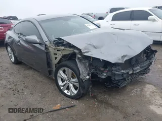 2012 Hyundai Genesis Coupe Premium z VIN KMHHT6KDXCU074094, wystawiony jako IAAI lot #41300505 z przebiegiem 153 404 mil mil oraz . Historia ofert i sprzedaży dostępna na DreamBid. Obrazek 1.