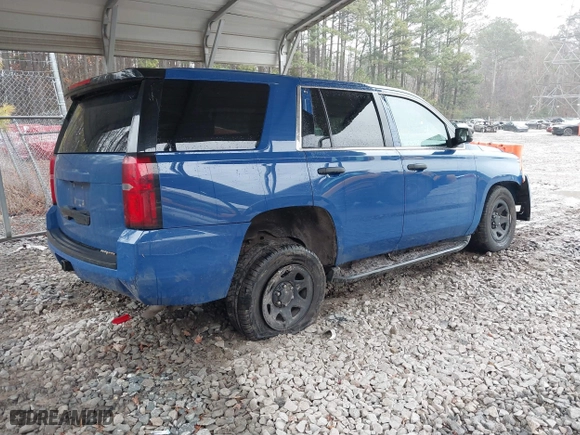 2015 Chevrolet Tahoe Commercial with VIN 1GNSK2EC1FR663199, listed as a IAAI auction lot 41552787 with 148,187 mi miles. Bid and sale history available at carsss.com. Image 4.
