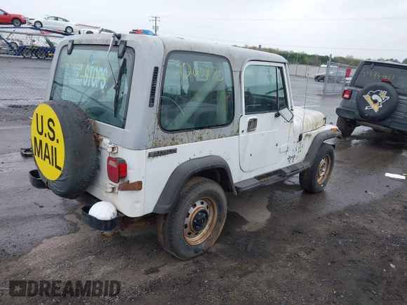 1990 Jeep Wrangler with VIN 2J4FY29T6LJ523487, listed as a IAAI auction lot 42008870 with 88,619 mi miles and . Bid and sale history available at DreamBid. Image 4.