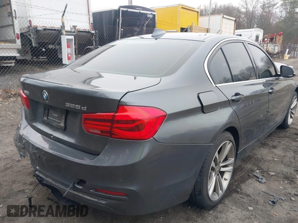 2018 BMW 3 Series with VIN WBA8F1C54JAE93207, listed as a IAAI auction lot 41876781 with 64,749 mi miles and . Bid and sale history available at DreamBid. Image 4.