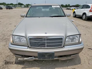 1999 Mercedes-Benz C 230/260/280/320 z VIN WDBHA24G4XA681981, wystawiony jako Copart lot #57758215 z przebiegiem Nie podano mil oraz Szkoda całkowita • Salvage title. Historia ofert i sprzedaży dostępna na DreamBid. Obrazek 5.