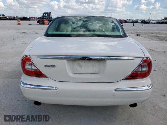 2006 Jaguar XJ Vanden Plas with VIN SAJWA82B16SH06996, listed as a Copart auction lot 62509025 with 80,236 mi miles and Salvage title. Bid and sale history available at DreamBid. Image 6.