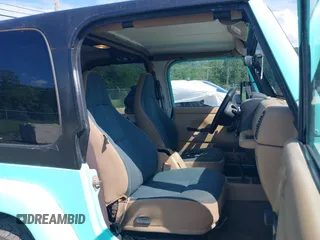 2002 Jeep Wrangler Sahara с VIN 1J4FA59S62P768112, выставлен на аукционе IAAI как лот 42657738 с пробегом 196 571 миль миль и . История ставок и продаж доступна на DreamBid. Изображение 5.