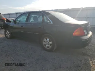 2001 Toyota Avalon XL z VIN 4T1BF28B61U175674, wystawiony jako Copart lot #49913765 z przebiegiem 170 245 mil mil oraz Tytuł czysty. Historia ofert i sprzedaży dostępna na DreamBid. Obrazek 2.