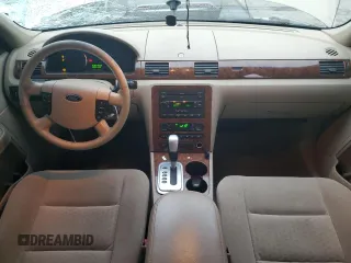 2007 Ford Five Hundred SEL z VIN 1FAHP27137G141919, wystawiony jako Copart lot #88551615 z przebiegiem 151 723 mil mil oraz Szkoda całkowita • Salvage title. Historia ofert i sprzedaży dostępna na DreamBid. Obrazek 8.