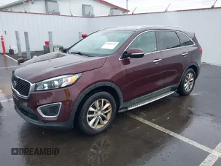 2018 Kia Sorento LX with VIN 5XYPG4A34JG347093, listed as a IAAI auction lot 41809115 with 106,494 mi miles. Bid and sale history available at carsss.com. Image 2.