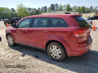 2013 Dodge Journey American Value with VIN 3C4PDCAB7DT695249, listed as a Copart auction lot 53935505 with 178,694 mi miles and Clean title. Bid and sale history available at DreamBid. Image 2.