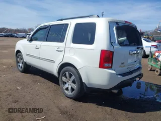 2013 Honda Pilot Touring with VIN 5FNYF3H9XDB006353, listed as a IAAI auction lot 41826557 with 174,552 mi miles and . Bid and sale history available at DreamBid. Image 3.