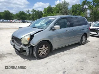 2007 Honda Odyssey EX-L with VIN 5FNRL38687B104840, listed as a Copart auction lot 51759295 with 213,206 mi miles and Salvage Title. Bid and sale history available at carsss.com. Image 1.