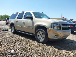 2012 Chevrolet Suburban LT with VIN 1GNSCJE03CR128206, listed as a IAAI auction lot 42002119 with 329,078 mi miles. Bid and sale history available at carsss.com. Image 1.