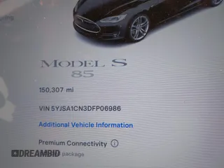 2013 Tesla Model S with VIN 5YJSA1CN3DFP06986, listed as a IAAI auction lot 41271801 with 150,307 mi miles and . Bid and sale history available at DreamBid. Image 7.