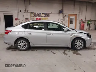 2019 Nissan Sentra S z VIN 3N1AB7AP7KY440764, wystawiony jako IAAI lot #41996693 z przebiegiem 34 594 mil mil oraz . Historia ofert i sprzedaży dostępna na DreamBid. Obrazek 14.