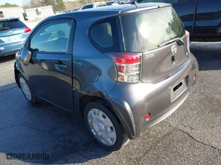 2014 Scion iQ with VIN JTNJJXB00EJ030409, listed as a IAAI auction lot 41352980 with 176,739 mi miles. Bid and sale history available at carsss.com. Image 3.