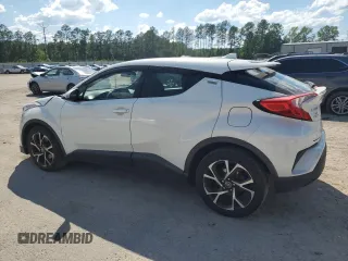 2018 Toyota C-HR XLE z VIN NMTKHMBX4JR031512, wystawiony jako Copart lot #55096715 z przebiegiem 100 522 mil mil oraz Szkoda całkowita • Salvage title. Historia ofert i sprzedaży dostępna na DreamBid. Obrazek 2.