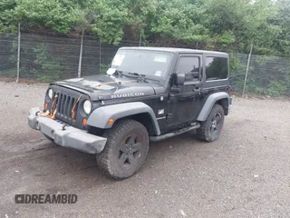 2007 Jeep Wrangler Rubicon with VIN 1J4GA64117L149666, listed as a IAAI auction lot 42252464 with 100,791 mi miles and . Bid and sale history available at DreamBid. Image 18.