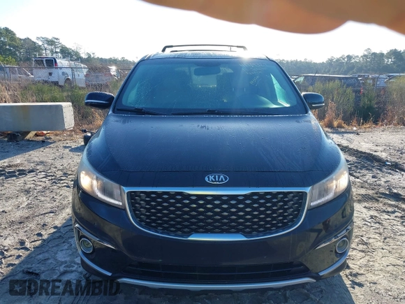 2015 Kia Sedona SX-L with VIN KNDME5C16F6037693, listed as a IAAI auction lot 41779327 with 149,552 mi miles and . Bid and sale history available at DreamBid. Image 12.