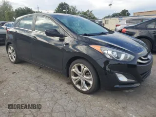 2013 Hyundai Elantra GT with VIN KMHD35LE0DU131291, listed as a Copart auction lot 70772334 with 54,428 mi miles and Salvage Title. Bid and sale history available at carsss.com. Image 4.