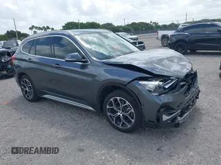 2022 BMW X1 sDrive28i with VIN WBXJG7C00N5U59675, listed as a IAAI auction lot 41915231 with 34,983 mi miles. Bid and sale history available at carsss.com. Image 1.