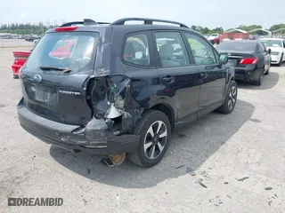 2018 Subaru Forester with VIN JF2SJABC3JH477514, listed as a IAAI auction lot 41880639 with 134,970 mi miles. Bid and sale history available at carsss.com. Image 4.