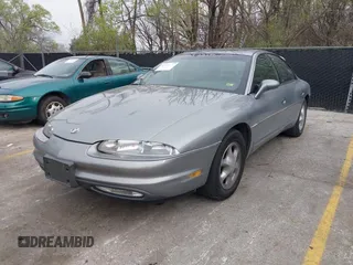 1995 Oldsmobile Aurora with VIN 1G3GR52C2S4100055, listed as a IAAI auction lot 41918157 with 106,329 mi miles and . Bid and sale history available at DreamBid. Image 2.