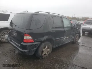 2001 Mercedes-Benz M-Class with VIN 4JGAB54E51A273024, listed as a Copart auction lot 80327264 with 211,120 mi miles and Salvage Title. Bid and sale history available at carsss.com. Image 3.