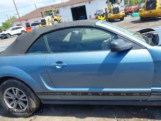 2005 Ford Mustang Deluxe z VIN 1ZVHT84N355249074, wystawiony jako IAAI lot #42298759 z przebiegiem 115 215 mil mil oraz . Historia ofert i sprzedaży dostępna na DreamBid. Obrazek 13.