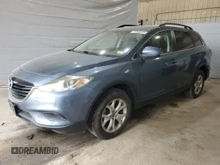2015 Mazda CX-9 Touring z VIN JM3TB3CV4F0453294, wystawiony jako Copart lot #57066405 z przebiegiem 119 046 mil mil oraz Szkoda całkowita • Salvage title. Historia ofert i sprzedaży dostępna na DreamBid. Obrazek 1.