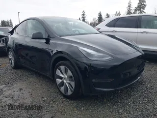 2023 Tesla Model Y Long Range with VIN 7SAYGAEE2PF905136, listed as a IAAI auction lot 41572597 with 33,425 mi miles and . Bid and sale history available at DreamBid. Image 1.