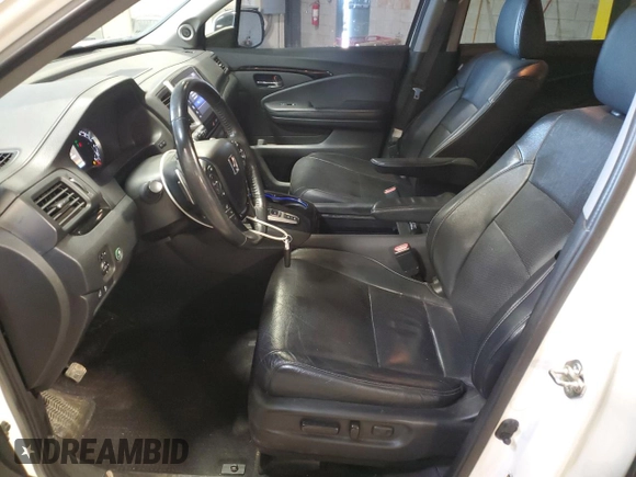 2017 Honda Pilot Elite with VIN 5FNYF6H08HB005758, listed as a Copart auction lot 53655725 with 124,218 mi miles and Salvage Title. Bid and sale history available at DreamBid. Image 7.
