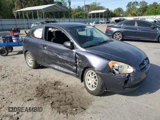 2007 Hyundai Accent GS with VIN KMHCM36CX7U045059, listed as a Copart auction lot 52089115 with 88,166 mi miles and Salvage title. Bid and sale history available at DreamBid. Image 4.