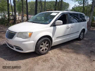 2011 Chrysler Town & Country Touring with VIN 2A4RR5DG1BR727331, listed as a IAAI auction lot 42039273 with 171,643 mi miles. Bid and sale history available at carsss.com. Image 2.