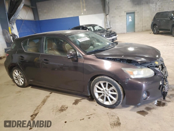 2011 Lexus CT 200h with VIN JTHKD5BH4B2043534, listed as a Copart auction lot 52693605 with 218,142 mi miles and Salvage Title. Bid and sale history available at DreamBid. Image 4.