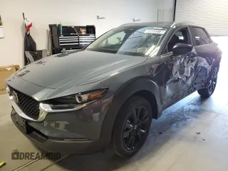 2025 Mazda CX-30 S Carbon Edition z VIN 3MVDMBCM0SM809688, wystawiony jako Copart lot #50693315 z przebiegiem 3 007 mil mil oraz Czysty tytuł • Clean title. Historia ofert i sprzedaży dostępna na DreamBid. Obrazek 1.