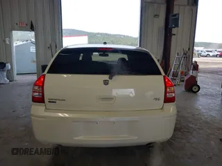 2006 Dodge Magnum z VIN 2D8GZ57286H100782, wystawiony jako IAAI lot #41816780 z przebiegiem 203 839 mil mil oraz . Historia ofert i sprzedaży dostępna na DreamBid. Obrazek 16.
