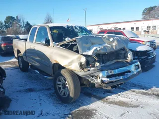 2002 Toyota Tundra SR5 with VIN 5TBRT34142S246044, listed as a IAAI auction lot 41355453 with 285,809 mi miles. Bid and sale history available at carsss.com. Image 1.