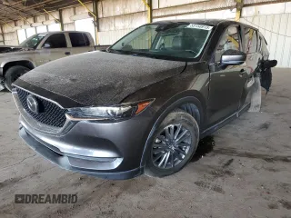 2020 Mazda CX-5 Touring with VIN JM3KFACMXL1852969, listed as a Copart auction lot 53150915 with 97,892 mi miles and Salvage Title. Bid and sale history available at carsss.com. Image 1.