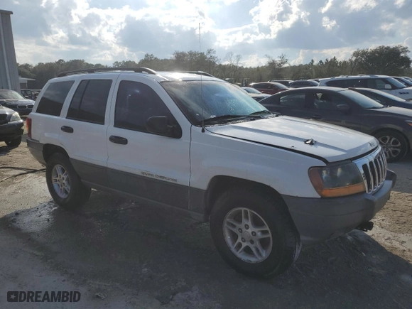 2002 Jeep Grand Cherokee Laredo with VIN 1J4GW48N02C205818, listed as a Copart auction lot 44737205 with 136,030 mi miles and Salvage Title. Bid and sale history available at carsss.com. Image 4.