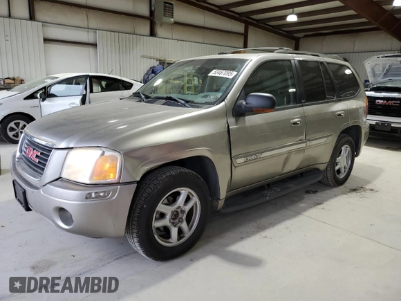 2003 GMC Envoy SLE z VIN 1GKDT13S432136642, wystawiony jako Copart lot #53467095 z przebiegiem 98 832 mil mil oraz Szkoda całkowita • Salvage title. Historia ofert i sprzedaży dostępna na DreamBid. Obrazek 1.