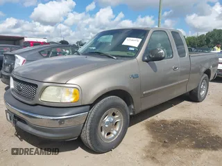 2002 Ford F-150 XL with VIN 1FTRX17222NA12740, listed as a IAAI auction lot 42546970 with 163,344 mi miles and . Bid and sale history available at DreamBid. Image 2.