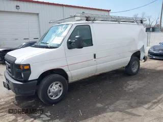 2014 Ford Econoline Cargo Super Duty Commercial with VIN 1FTSE3ELXEDA25101, listed as a IAAI auction lot 41876669 with 221,683 mi miles and . Bid and sale history available at carsss.com. Image 18.