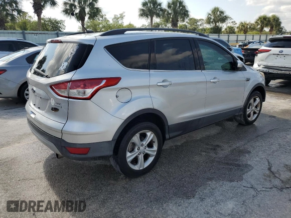 2013 Ford Escape SE with VIN 1FMCU9GX0DUC37218, listed as a Copart auction lot 53992485 with 188,571 mi miles and Salvage Title. Bid and sale history available at DreamBid. Image 3.