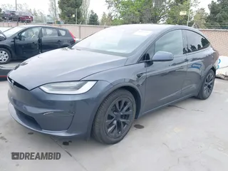 2022 Tesla Model X Plaid with VIN 7SAXCBE6XNF337687, listed as a IAAI auction lot 42035097 with 18,756 mi miles and . Bid and sale history available at DreamBid. Image 2.