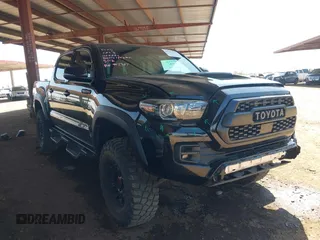2019 Toyota Tacoma SR with VIN 5TFCZ5AN1KX190749, listed as a IAAI auction lot 42301151 with 83,209 mi miles and . Bid and sale history available at DreamBid. Image 1.