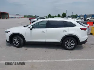 2019 Mazda CX-9 Touring with VIN JM3TCACY1K0334804, listed as a IAAI auction lot 42411662 with 49,447 mi miles and . Bid and sale history available at DreamBid. Image 14.