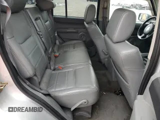 2007 Jeep Commander Sport z VIN 1J8HG48K97C598103, wystawiony jako Copart lot #65140225 z przebiegiem 204 638 mil mil oraz Czysty tytuł • Clean title. Historia ofert i sprzedaży dostępna na DreamBid. Obrazek 10.