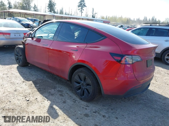 2024 Tesla Model Y Long Range with VIN 7SAYGDEE9RF199805, listed as a IAAI auction lot 42018221 with 7,359 mi miles. Bid and sale history available at carsss.com. Image 3.