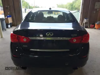 2015 Infiniti Q50 Premium z VIN JN1BV7AR9FM423471, wystawiony jako IAAI lot #42641857 z przebiegiem 86 919 mil mil oraz . Historia ofert i sprzedaży dostępna na DreamBid. Obrazek 16.
