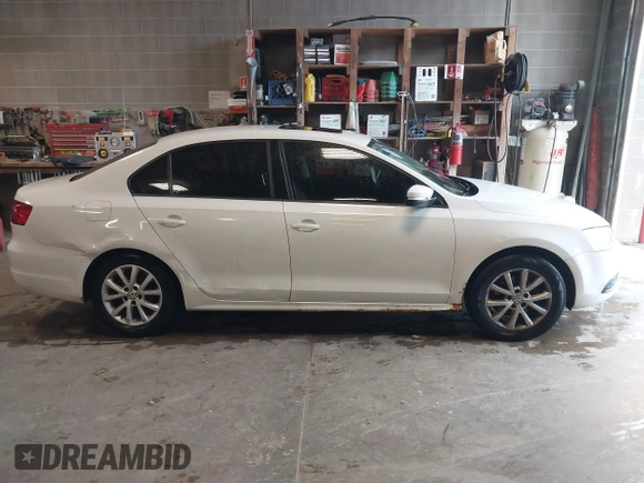2011 Volkswagen Jetta SE with VIN 3VWDX7AJXBM315916, listed as a IAAI auction lot 42311284 with 207,297 mi miles and . Bid and sale history available at DreamBid. Image 13.